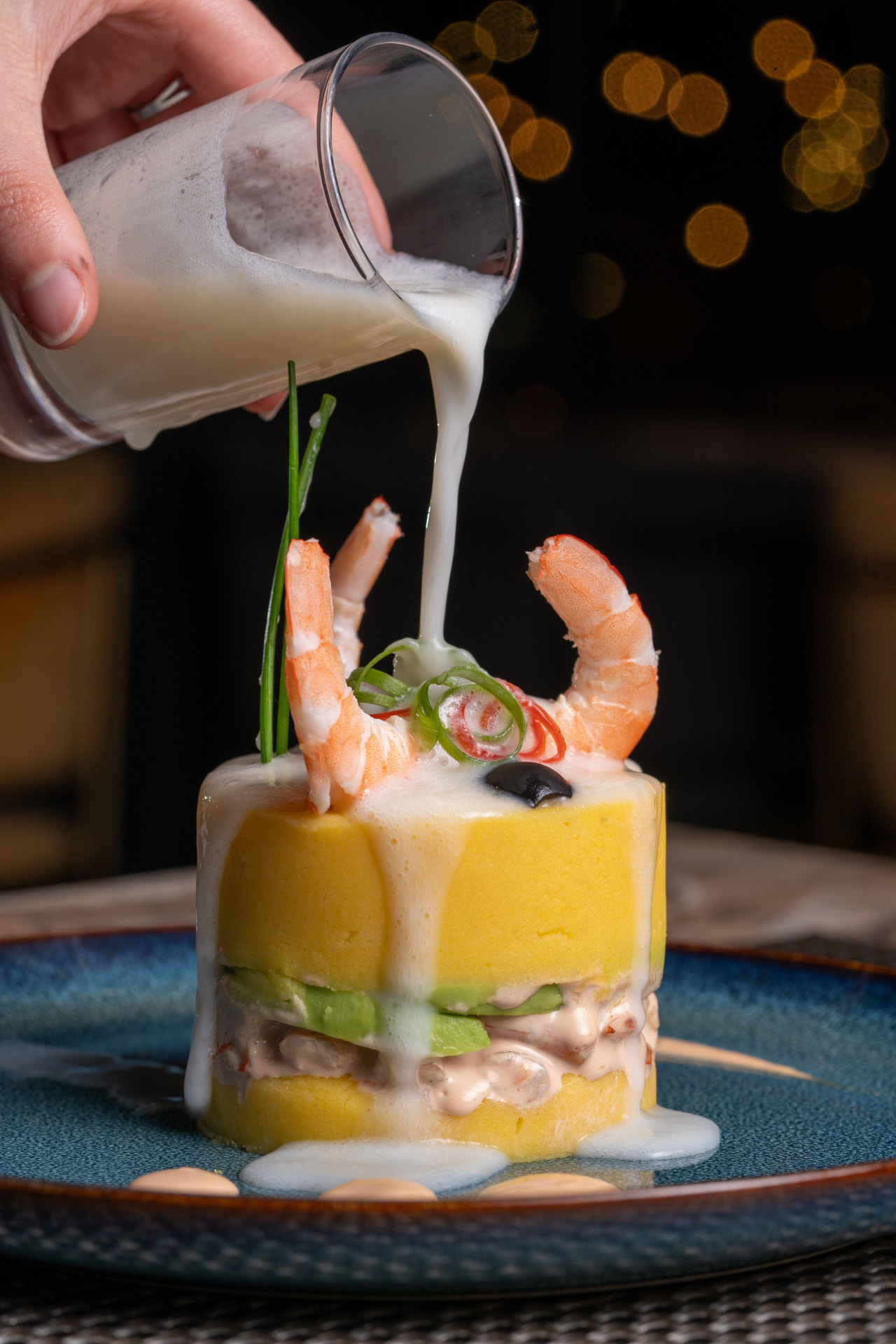 A beautifully plated Peruvian seafood dish
